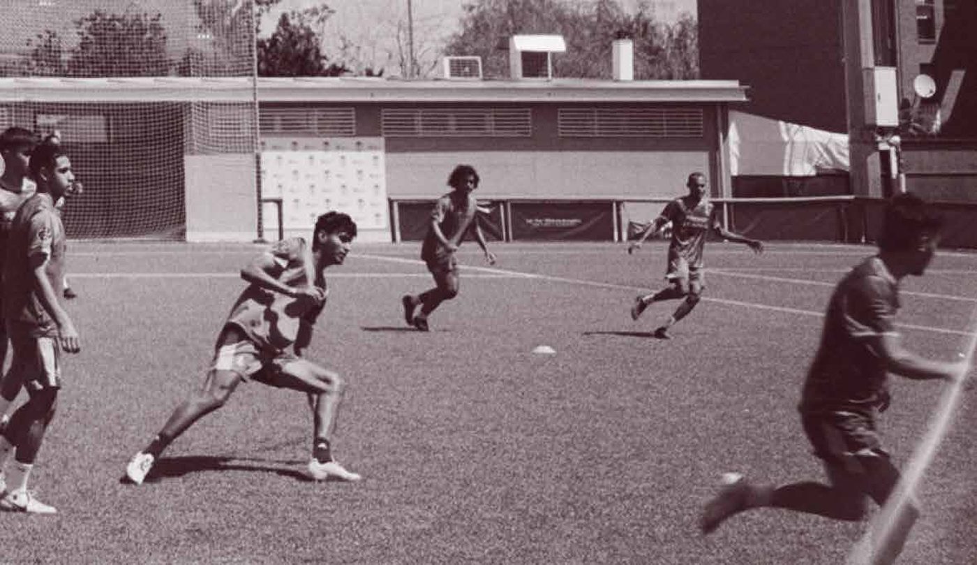 EKANA — footballers in training on an artificial pitch